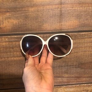 White sunglasses gold chain detail